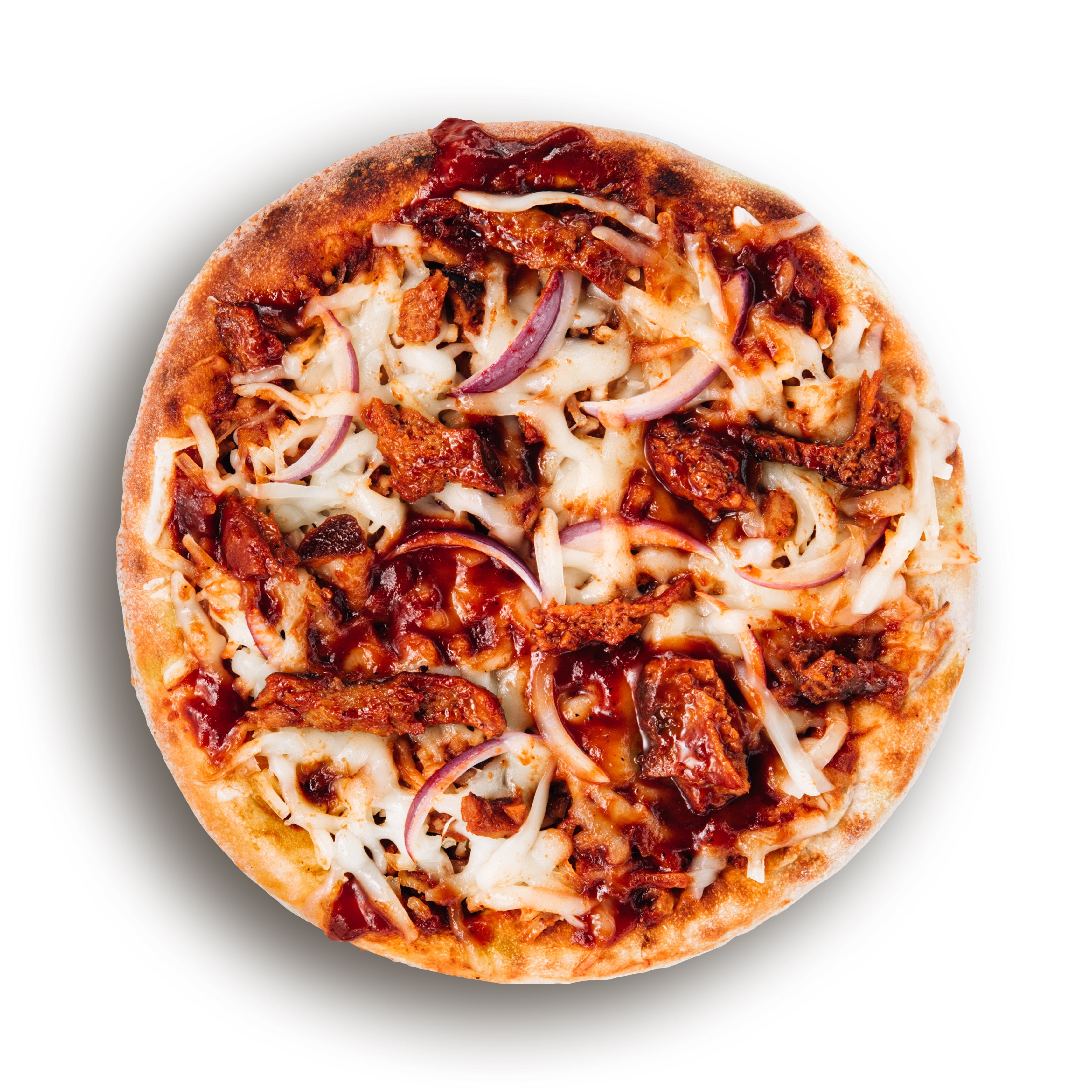 A BBQ seitan pizza with red onion and dairy-free mozzarella