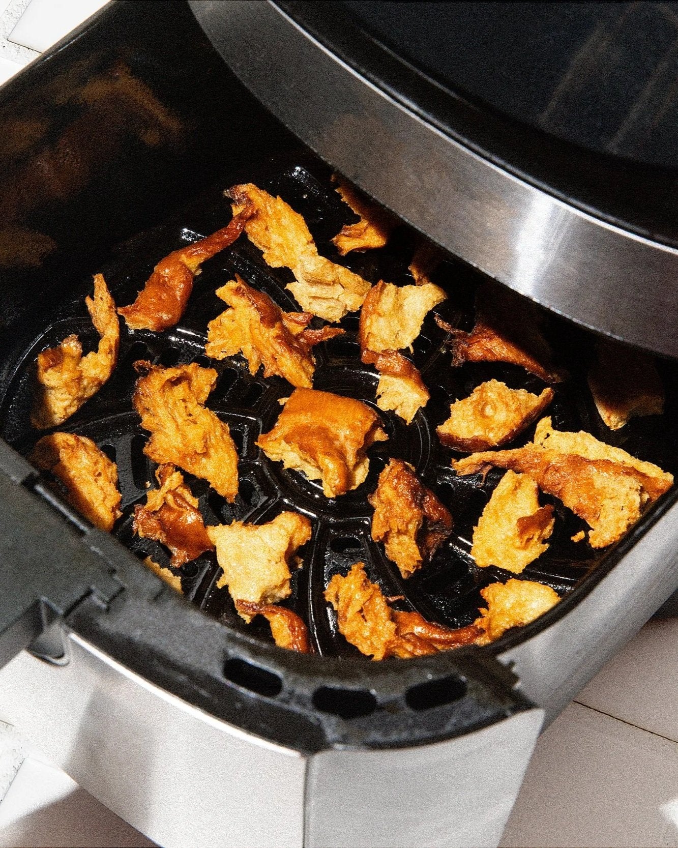 Seitan in an air fryer basket
